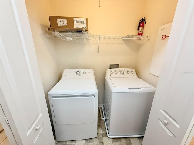 15922 Fishhawk Creek Ln, Lithia, FL 33547 - washroom featuring washing machine and dryer