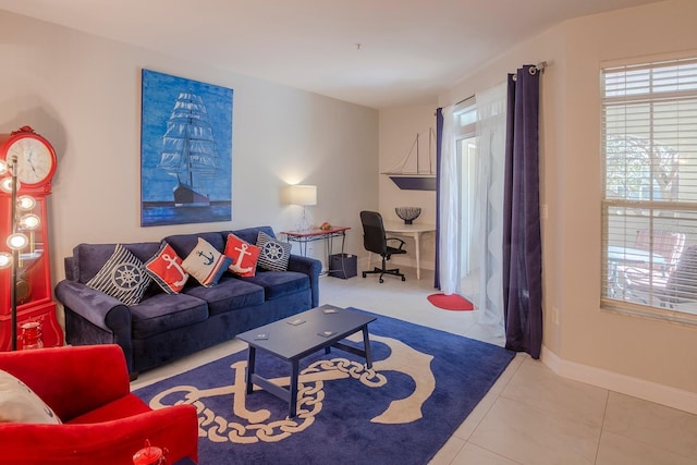 1230 S Missouri Ave Unit 704, Clearwater, FL 33756 - tiled living area with a desk and baseboards