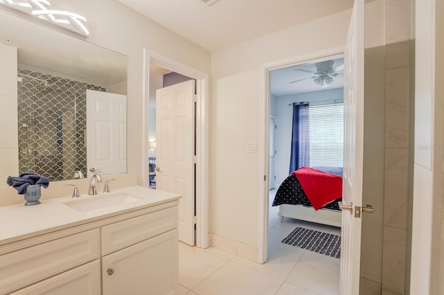 1230 S Missouri Ave Unit 704, Clearwater, FL 33756 - full bathroom featuring vanity, ensuite bath, tile patterned flooring, and ceiling fan