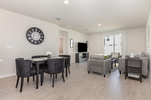 7119 Amelia River Dr, Parrish, FL 34219 - dining room featuring light wood-type flooring, baseboards, and recessed lighting