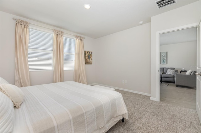 7119 Amelia River Dr, Parrish, FL 34219 - carpeted bedroom featuring baseboards