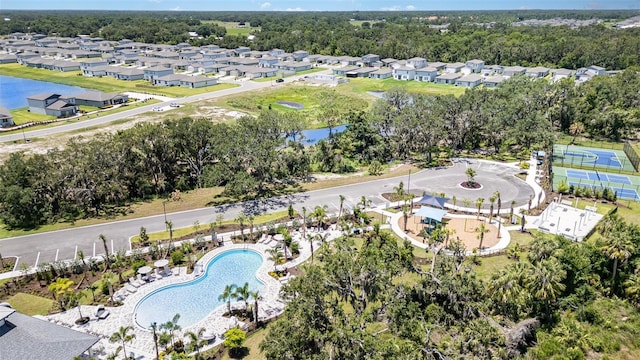7119 Amelia River Dr, Parrish, FL 34219 - aerial overview of property's location with a pool area and nearby suburban area