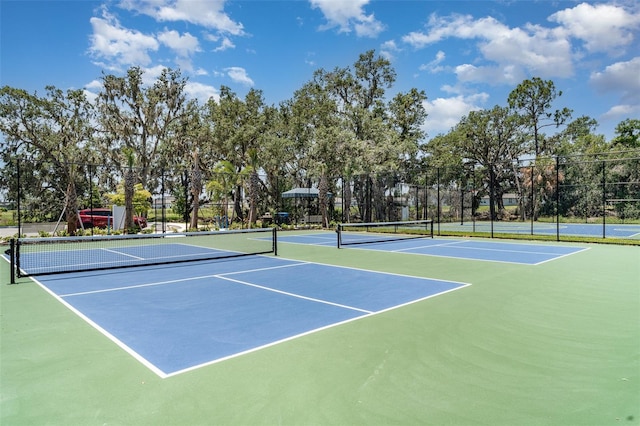 7119 Amelia River Dr, Parrish, FL 34219 - view of tennis court featuring community basketball court