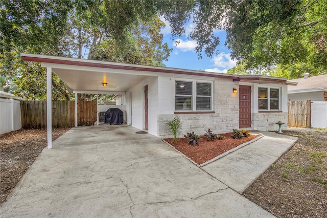 2646 61st Ave N, Saint Petersburg, FL 33714 - ranch-style home with an attached carport and concrete driveway