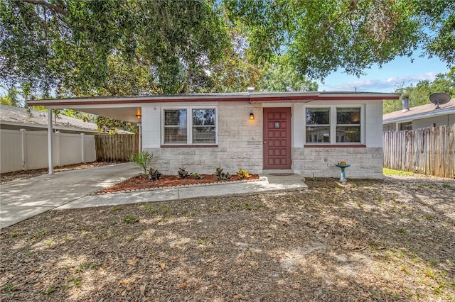 2646 61st Ave N, Saint Petersburg, FL 33714 - single story home featuring concrete driveway and a carport