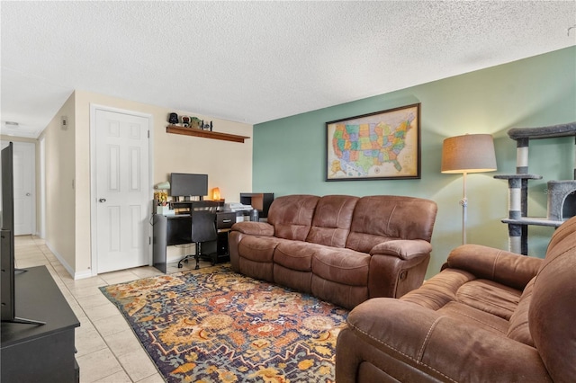 2646 61st Ave N, Saint Petersburg, FL 33714 - living room with light tile patterned flooring, a desk, and a textured ceiling