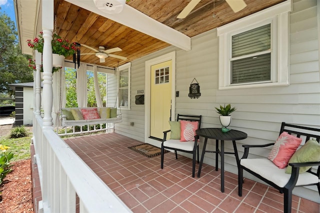1003 W Indiana Ave, Tampa, FL 33603 - covered porch featuring a ceiling fan