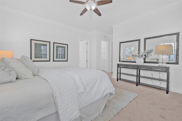 135 Commonwealth Ct N, Saint Petersburg, FL 33716 - bedroom with light carpet, ornamental molding, and a ceiling fan