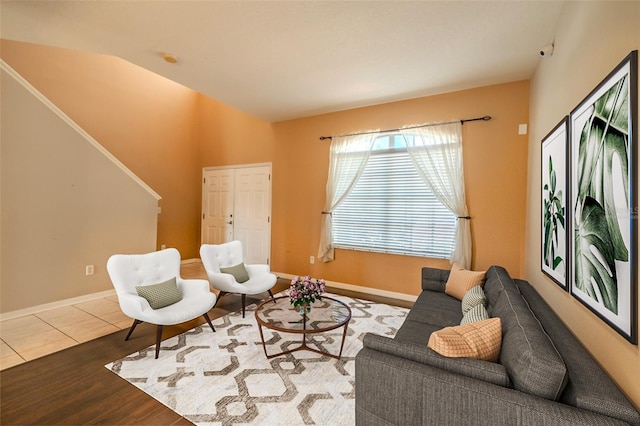7852 Stoney Hill Dr, Wesley Chapel, FL 33545 - living room with wood finished floors, stairs, and baseboards