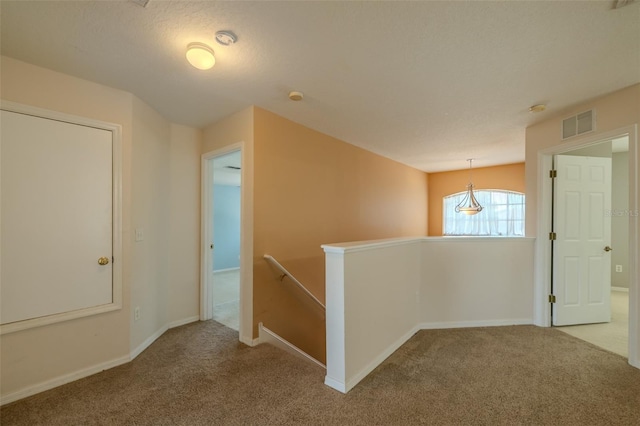 7852 Stoney Hill Dr, Wesley Chapel, FL 33545 - hallway with an upstairs landing, carpet flooring, and baseboards