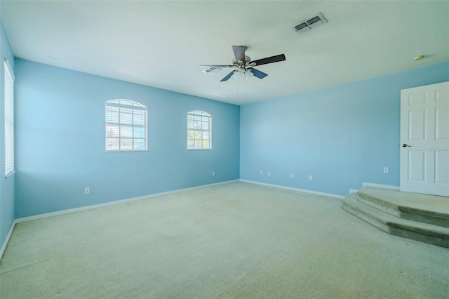 7852 Stoney Hill Dr, Wesley Chapel, FL 33545 - empty room featuring a ceiling fan, baseboards, and carpet floors