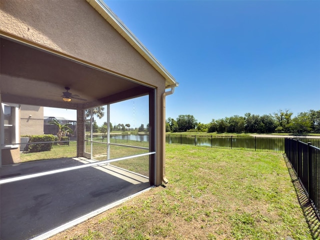 7852 Stoney Hill Dr, Wesley Chapel, FL 33545 - view of yard featuring a water view, a ceiling fan, and a patio