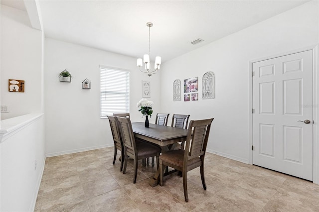 8496 Starlight Loop, Parrish, FL 34219 - dining room with a chandelier, baseboards, and light tile patterned floors