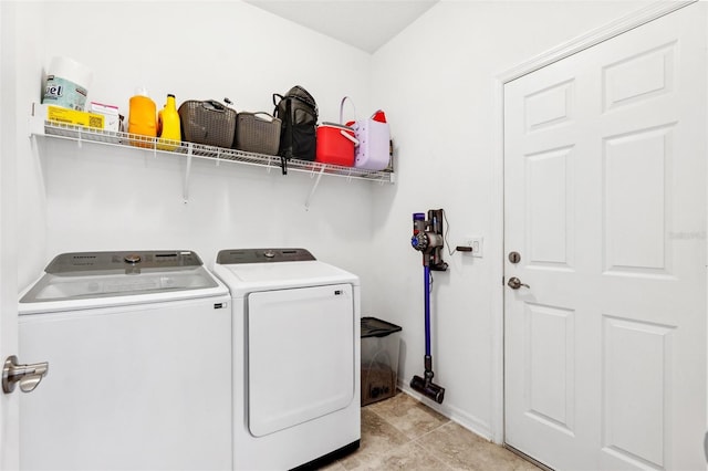 8496 Starlight Loop, Parrish, FL 34219 - laundry area with separate washer and dryer and baseboards