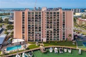 51 Island Way Unit 309, Clearwater Beach, FL 33767 - view of apartment building / complex with a water view and a view of city