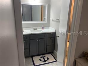 51 Island Way Unit 309, Clearwater Beach, FL 33767 - bathroom featuring vanity