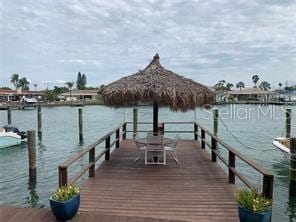 51 Island Way Unit 309, Clearwater Beach, FL 33767 - dock featuring a water view and a gazebo