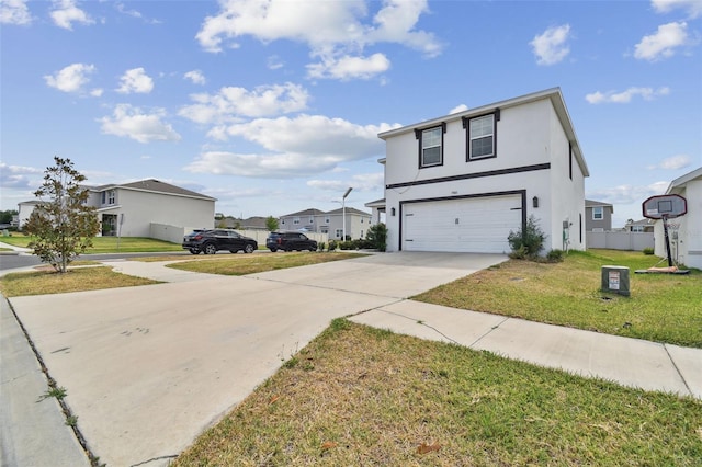 view of property exterior featuring driveway, a residential view, a lawn, a garage, and stucco siding