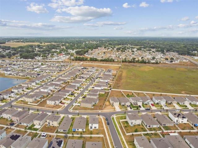 aerial view of property's location with nearby suburban area
