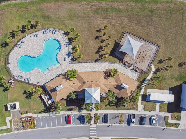 drone / aerial view of a pool