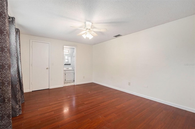 12019 106th Ct, Largo, FL 33778 - spare room with ceiling fan, wood finished floors, and a textured ceiling