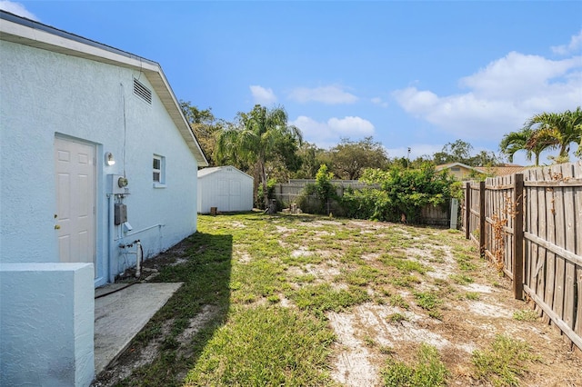 12019 106th Ct, Largo, FL 33778 - fenced backyard featuring a shed