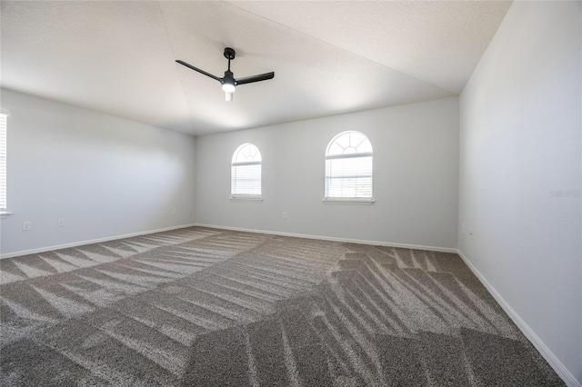 14384 NW 160th Ln, Alachua, FL 32615 - carpeted spare room featuring a ceiling fan, lofted ceiling, and baseboards