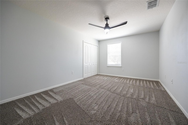 14384 NW 160th Ln, Alachua, FL 32615 - empty room with carpet, a ceiling fan, baseboards, and a textured ceiling