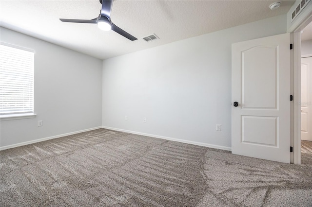 14384 NW 160th Ln, Alachua, FL 32615 - unfurnished room featuring carpet, ceiling fan, a smoke detector, a textured ceiling, and baseboards
