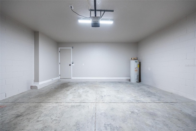 14384 NW 160th Ln, Alachua, FL 32615 - garage with electric water heater, a garage door opener, and concrete block wall