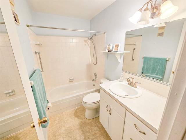 2850 59th St S Unit 310, Gulfport, FL 33707 - full bath featuring tub / shower combination, vanity, toilet, and tile patterned flooring