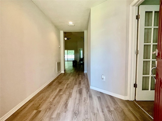 6376 SW 117th Street Rd, Ocala, FL 34476 - hall with wood finished floors and baseboards