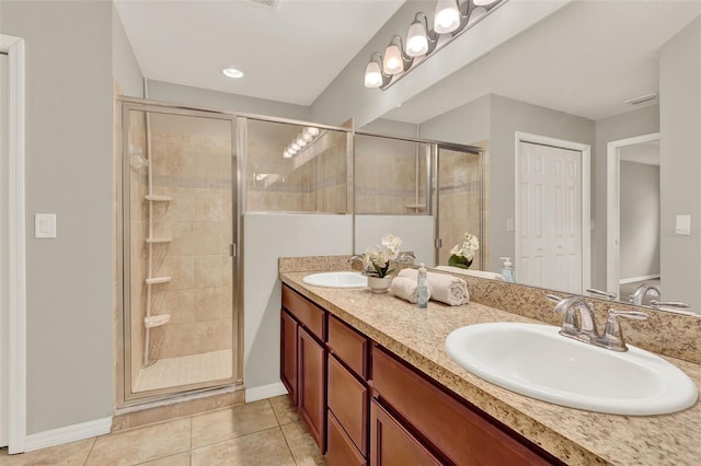 6376 SW 117th Street Rd, Ocala, FL 34476 - full bath with double vanity, a shower stall, and tile patterned floors