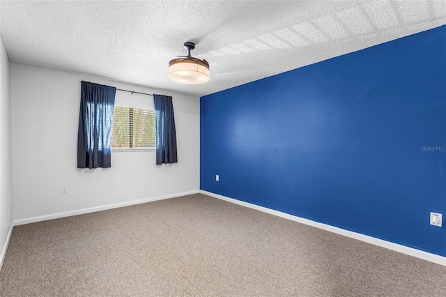10511 Waterview Ct Unit 10511, Tampa, FL 33615 - carpeted spare room featuring baseboards and a textured ceiling