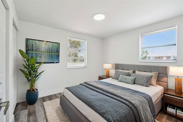 bedroom with wood finished floors