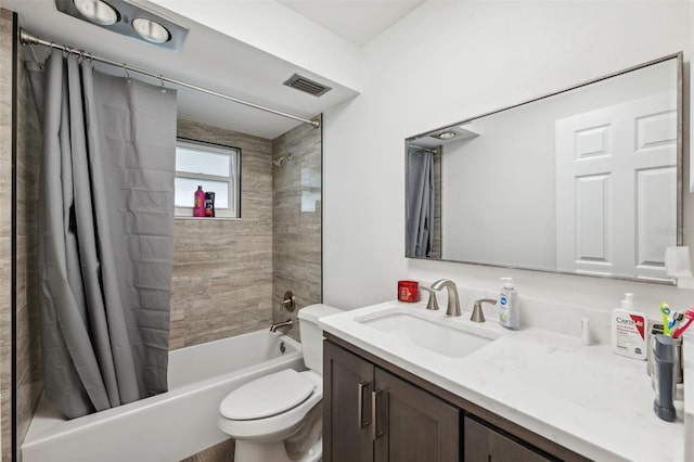 full bath with shower / bath combo with shower curtain, toilet, and vanity
