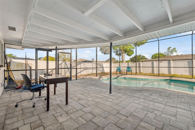 unfurnished sunroom featuring a pool and beamed ceiling