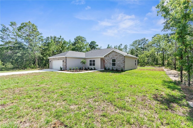 16247 Little Auk Rd, Weeki Wachee, FL 34614 - single story home featuring stone siding, concrete driveway, an attached garage, a front yard, and stucco siding