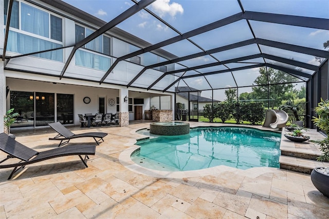 17724 Daisy Farm Dr, Lutz, FL 33559 - view of pool with a water slide, a patio, a pool with connected hot tub, and glass enclosure