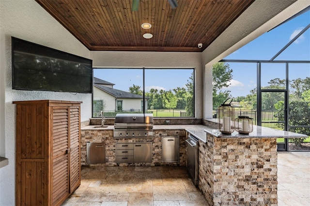 17724 Daisy Farm Dr, Lutz, FL 33559 - view of patio featuring exterior kitchen and a lanai