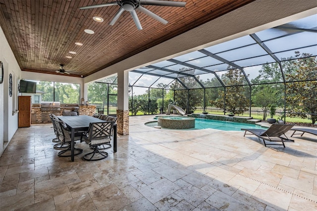 17724 Daisy Farm Dr, Lutz, FL 33559 - view of patio / terrace featuring ceiling fan, area for grilling, a pool with connected hot tub, and glass enclosure