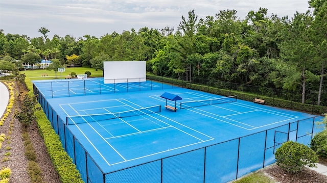 17724 Daisy Farm Dr, Lutz, FL 33559 - view of tennis court featuring a view of trees