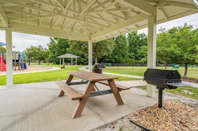 17724 Daisy Farm Dr, Lutz, FL 33559 - view of patio / terrace with a gazebo, view of scattered trees, and grilling area