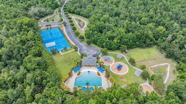 17724 Daisy Farm Dr, Lutz, FL 33559 - bird's eye view of a pool area and a heavily wooded area