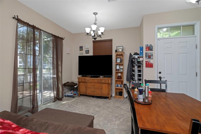 7001 Interbay Blvd Unit 242, Tampa, FL 33616 - living area featuring a chandelier