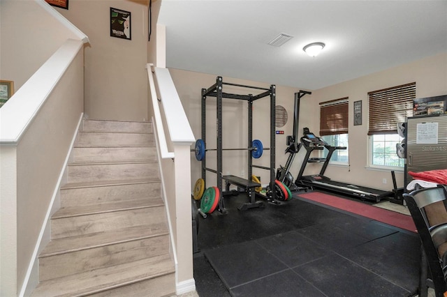 7001 Interbay Blvd Unit 242, Tampa, FL 33616 - exercise room featuring baseboards