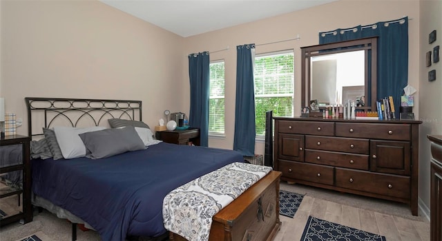 7001 Interbay Blvd Unit 242, Tampa, FL 33616 - bedroom with light wood finished floors