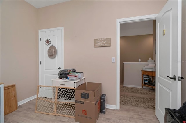 7001 Interbay Blvd Unit 242, Tampa, FL 33616 - entryway featuring light wood-type flooring and baseboards