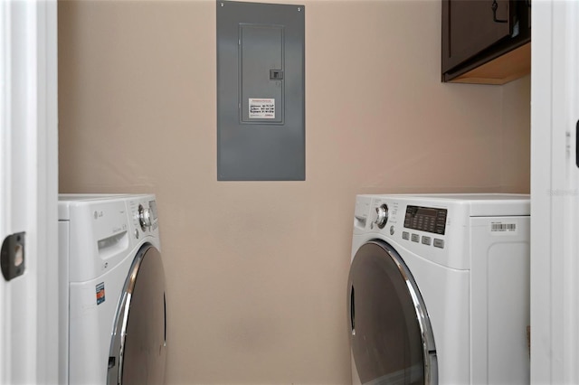 7001 Interbay Blvd Unit 242, Tampa, FL 33616 - washroom featuring cabinet space, electric panel, and independent washer and dryer