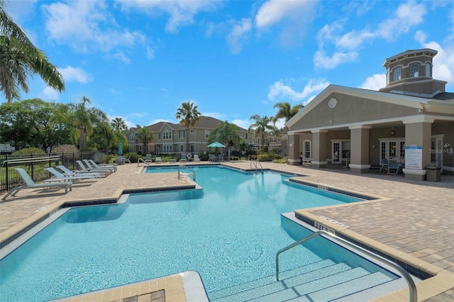 7001 Interbay Blvd Unit 242, Tampa, FL 33616 - community pool featuring a patio area